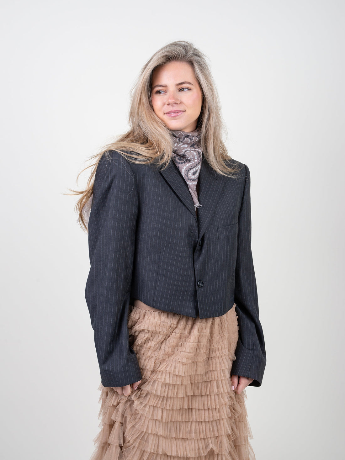 Vintage pinstripe blazers vergeleken: de plek van upcycled